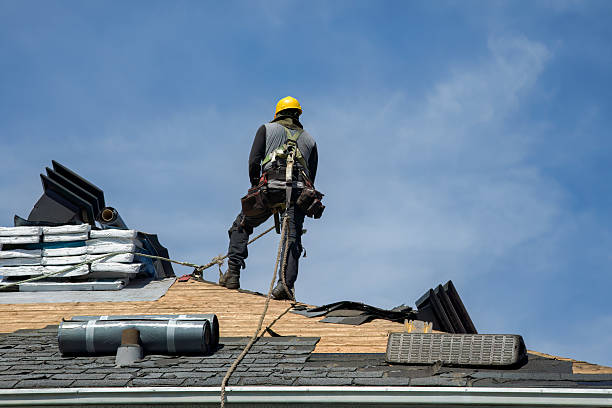 Professional Gutter Installation technician working in Pineland, FL